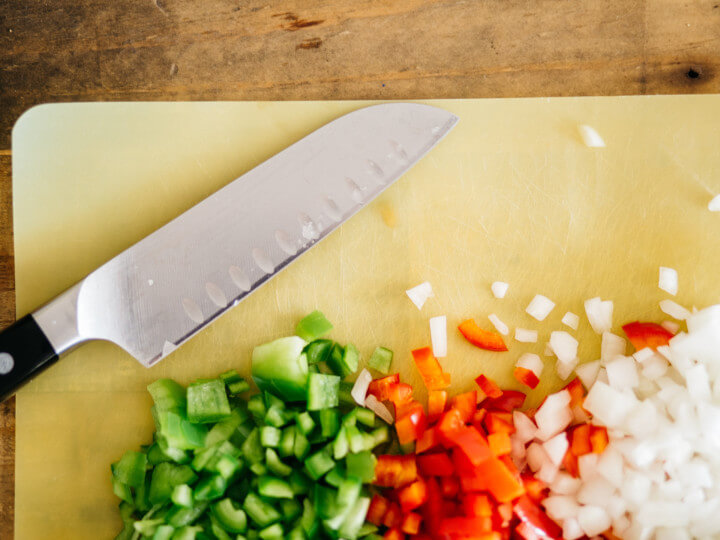 jenna cutting vegitables with Knife.720×540