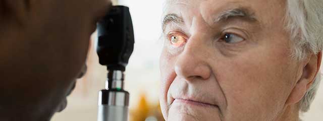 Man Having Eye Exam for Low Vision