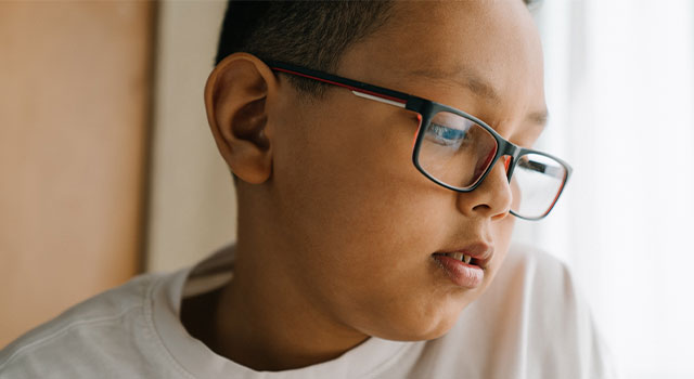 Myopic child wearing glasses