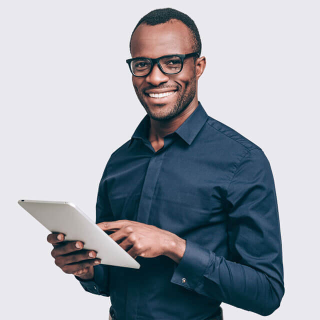 african american guy smiling with tablet