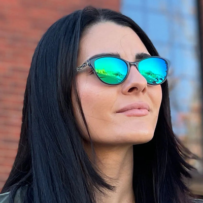woman wearing grey eye of faith sunglasses