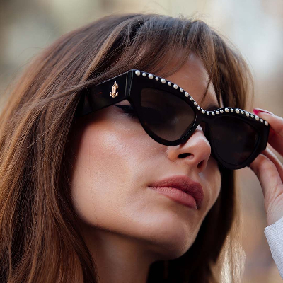 woman brown hair wearing jimmy choo sunglasses 400x400.jpg