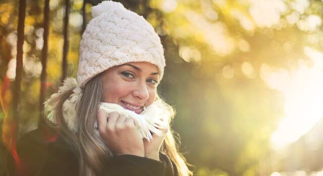 happy woman in winter outdoors