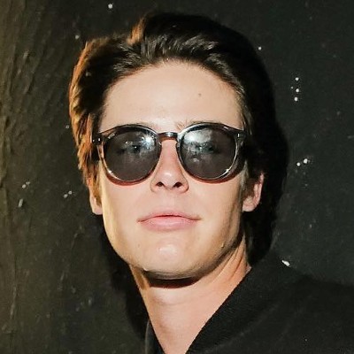 young man wearing hugo boss sunglasses