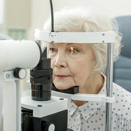 Elderly woman having eye exam in Lincoln Park