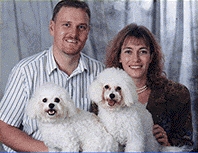 Dr's Sandra and Andrew Mann and their 2 dogs