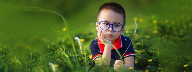 Optometrist, little asian boy wearing eyeglasses in Cromwell, CT
