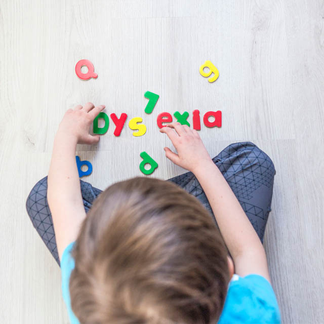 child spelling dyslexia top birdseye
