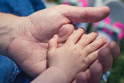 baby child grandparent hands