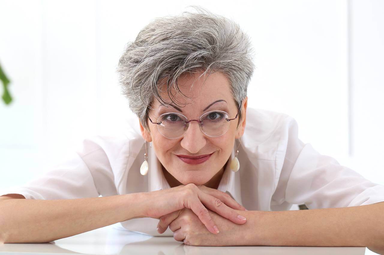 Senior Woman Smiling Glasses 1280×853