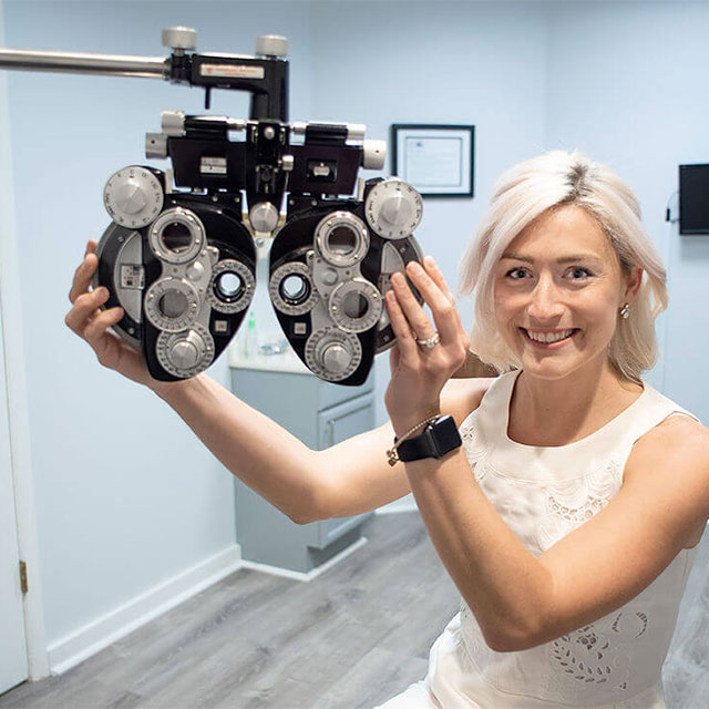 Optometrist demonstrating  latest eye technology for eye exams