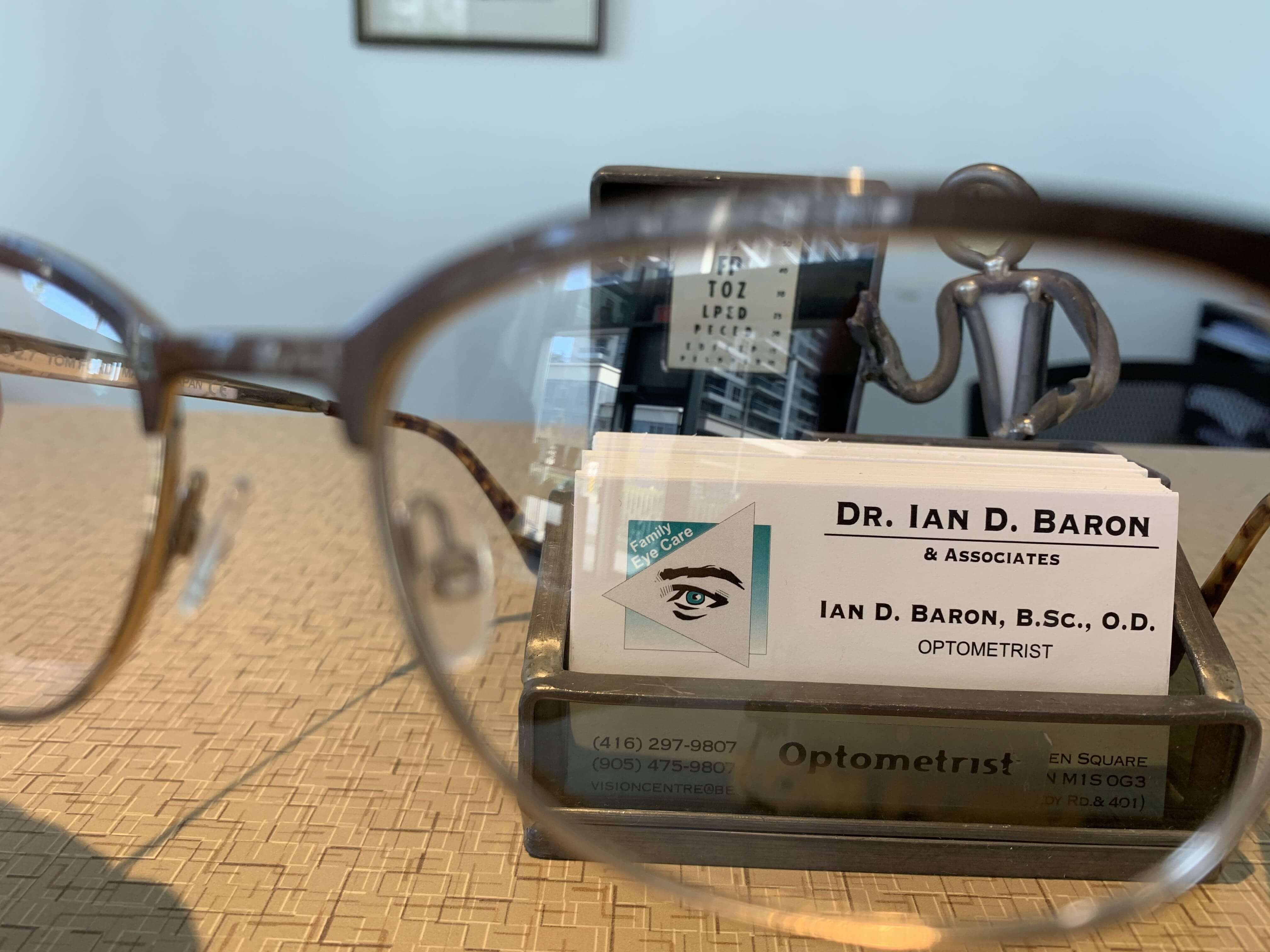 Dr. Ian D. Baron Business card, with eyeglasses in back