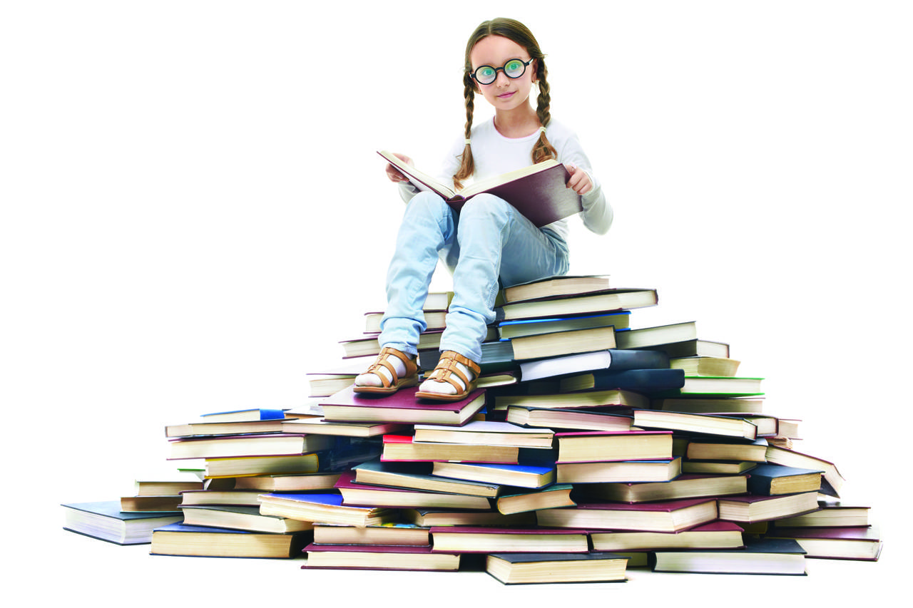 kid on book pile background 1280×853