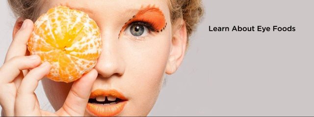 Eye doctor, woman holding an orange over her eye in Lee’s Summit and Lenexa