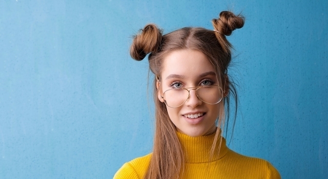 girl yellow sweater eyeglasses 640×350