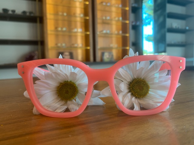 pair of pink spexwax eyeglasses