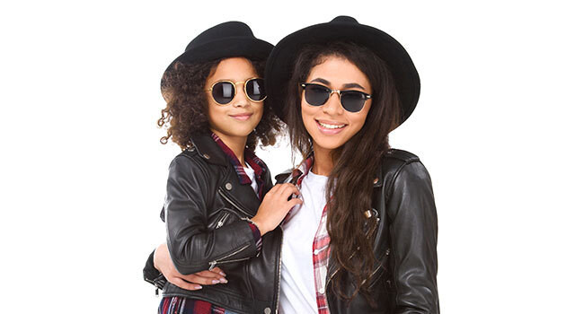 mom and daughter with sunglasses and black hats.jpg