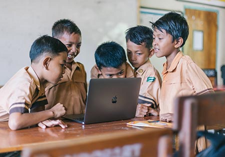 boys using laptop