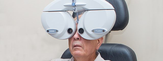 Eye doctor, senior man at an eye exam in Fort Collins, CO