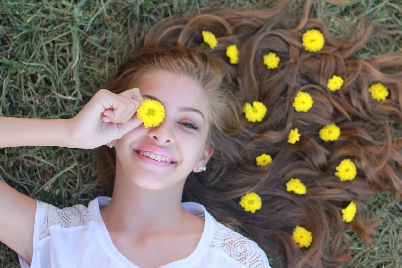 happy girl field of flowers 1280x853
