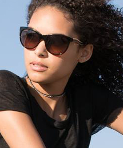 Model wearing Serengeti sunglasses