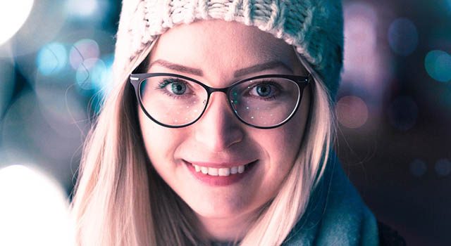 woman smiling wearing eyeglasses_640x350 640x350
