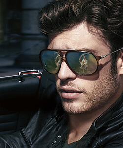 Model wearing Carrera sunglasses