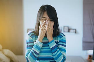 Woman With Allergy Symptoms