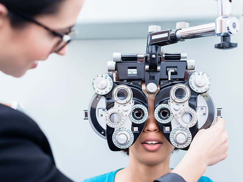Female Eye Doctor Performing an Eye Exam