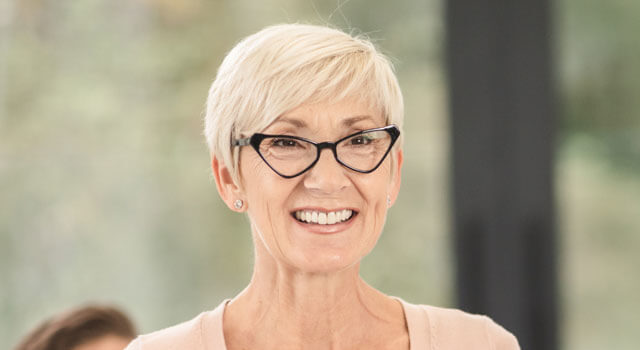 happy senior woman wearing eyeglasses 640