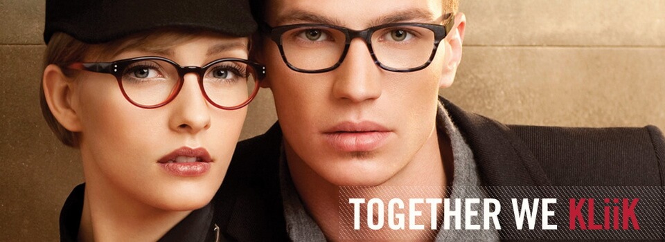 Couple Wearing Kliik Designer Eyeglass Frames