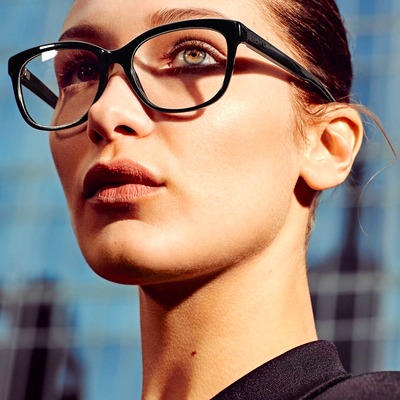 woman wearing michael kors eyeglasses 400×400 1.jpg