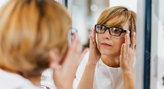 woman trying a new pair of prescription eyeglasses