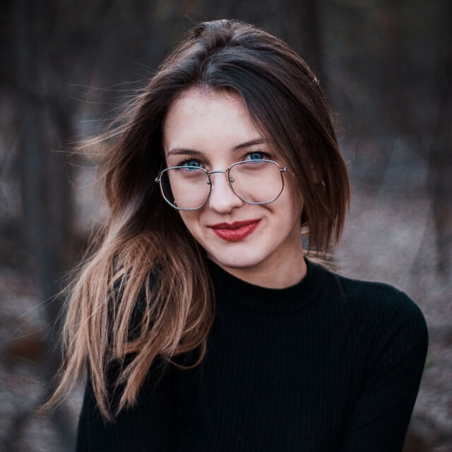 girl-in-black-sweater-smiling-640