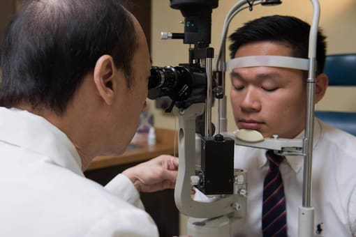 dr. giving eye exam.jpeg