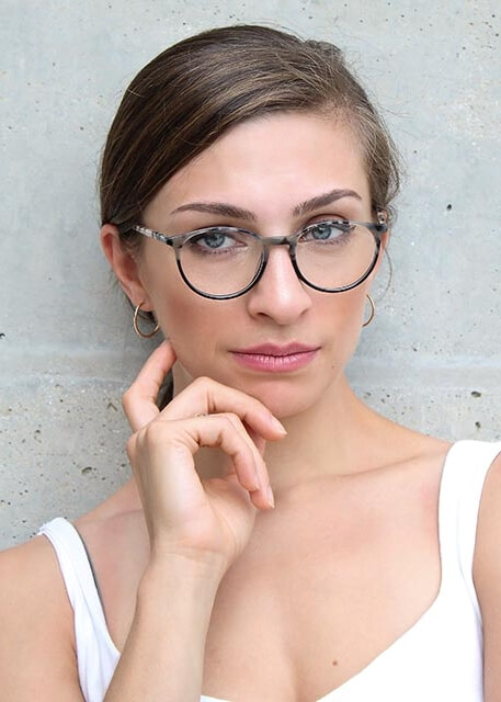 woman hairup eyeglasses