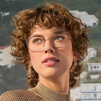 young woman wearing copper ted baker eyeglasses
