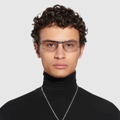 man wearing grey balenciaga eyeglasses