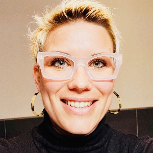 happy woman wearing vue dc eyeglasses 300x300