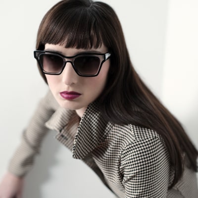 woman long brown hair wearing blake kuwahara sunglasses 400x400 min