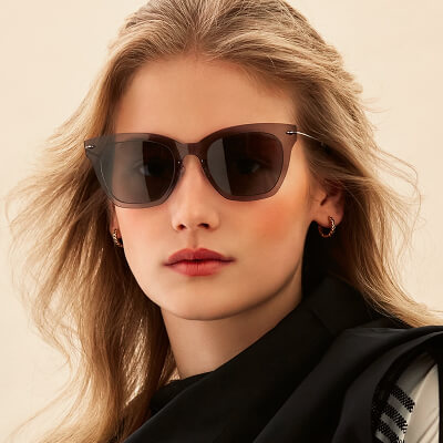 blond woman wearing sunglasses 400x400