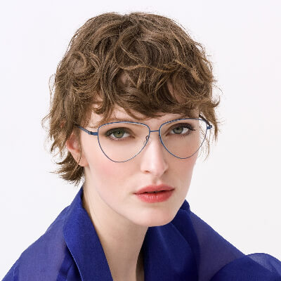 woman wearing purple rimmed lindberg eyeglasses 400x400