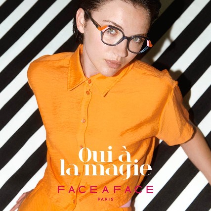 woman wearing orange face a face eyeglasses