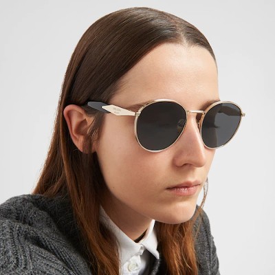 woman wearing prada sunglasses