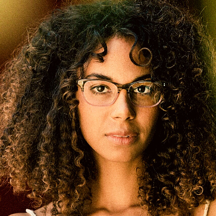 woman curly hair wearing salt eyeglasses 427x427