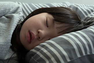 asian child sleeping ortho k