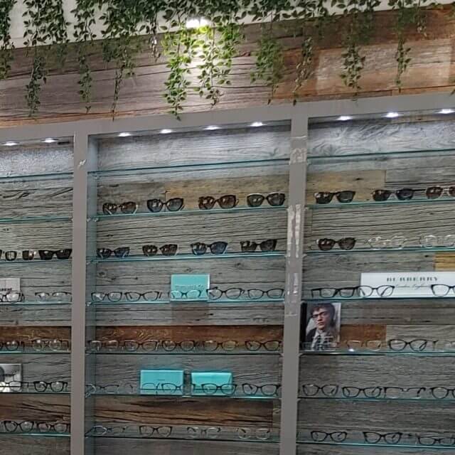 wood wall eyeglass display