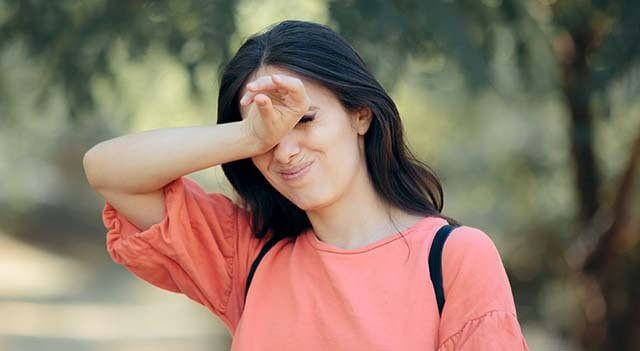 woman scratching itchy eyes.jpg