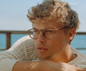 Model wearing Garrett Leight eyeglasses