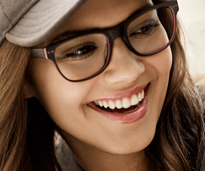 smiling girl wearing prodesign eyeglasses